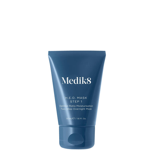 Blue tube of Medik8 H.E.O. MASK step 1 skincare product on a white background