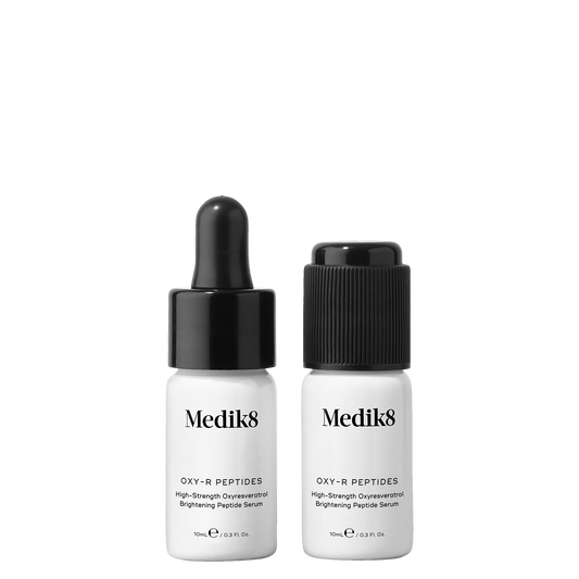 Two Medik8 OXY-R PEPTIDES skincare serum bottles on a white background